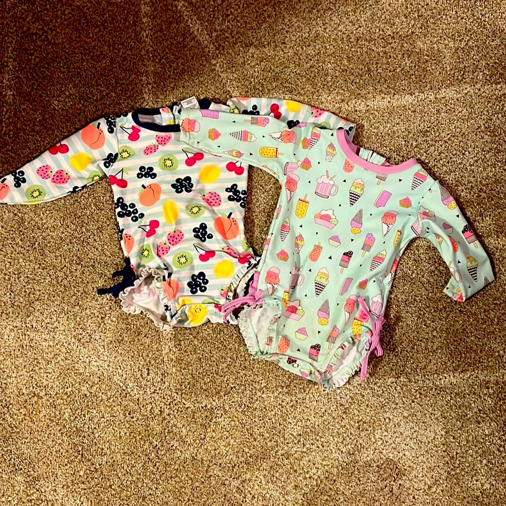 Two ruffle butt swim suits with sleeves 18m